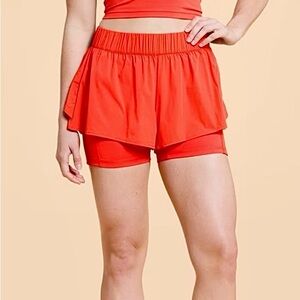 Blogilates Ruffle Shorts, mid-rise Orange NWT size LARGE